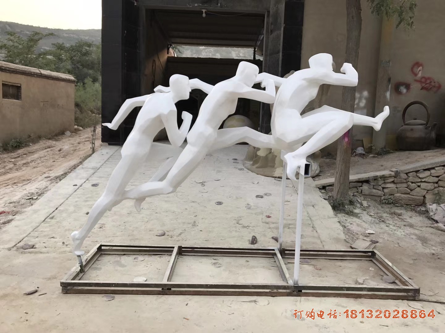 校园不锈钢跨栏人物(wù)雕塑